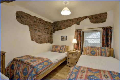 Mid Twin Bedroom in Luccombe Cottage