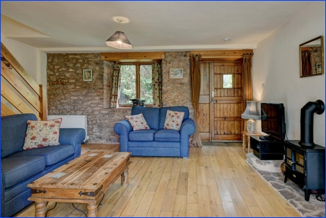 Lounge & dining area in Bossington Cottage